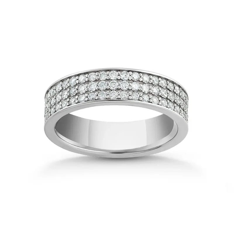 This image features a stunning wedding band from Ex Aurum Jewelers, categorized under wedding jewelry. The elegant ring showcases a wide band made of polished white gold, adorned with three rows of intricately set diamonds. The sparkling diamonds cover the top surface of the band, offering a luxurious and timeless design ideal for wedding ceremonies. The craftsmanship and high-quality materials reflect Ex Aurum Jewelers' dedication to creating exquisite wedding jewelry pieces.