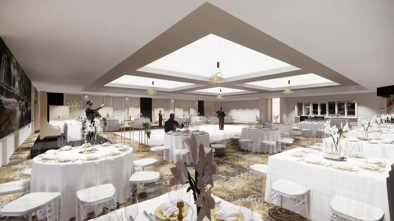 The image depicts the interior of the wedding venue Le Châteaubriand, categorized under Wedding Venues on Mariage Elegant, Canada. The spacious room features elegantly set round tables draped in white tablecloths, each adorned with floral centerpieces and gold-accented tableware, creating a sophisticated atmosphere. Soft, ambient lighting emanates from modern chandeliers suspended from the ceiling, complementing the room's luxurious decor. The layout suggests a versatile space ideal for wedding receptions, accommodating numerous guests comfortably. The overall design reflects a blend of elegance and functionality, perfect for a memorable wedding celebration.