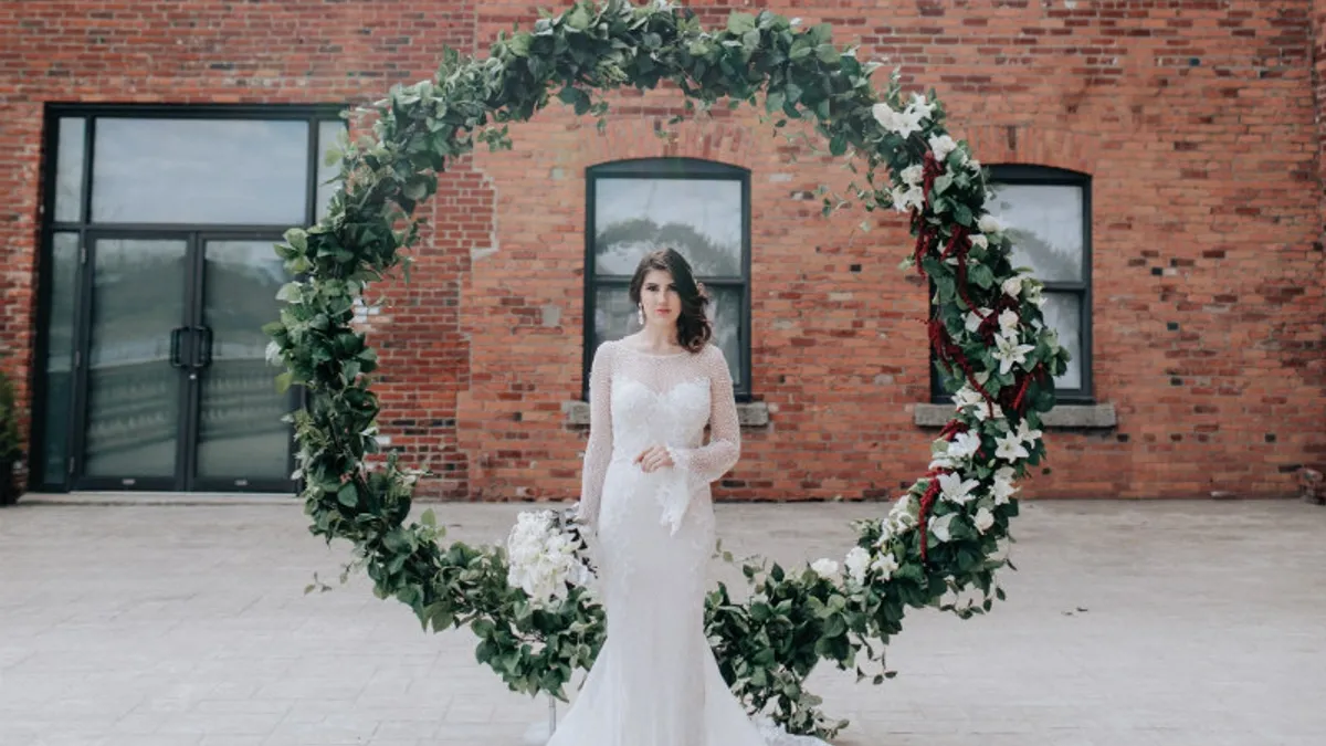 elegant wedding urban emerald inspired wedding with hanging greenery0