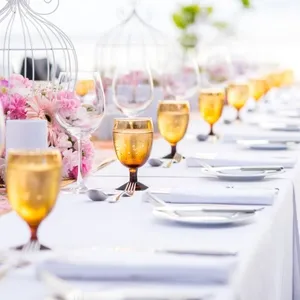 Table setting at a luxury wedding and Beautiful flowers on the table. Table setting at a luxury wedding and Beautiful flowers on the table.